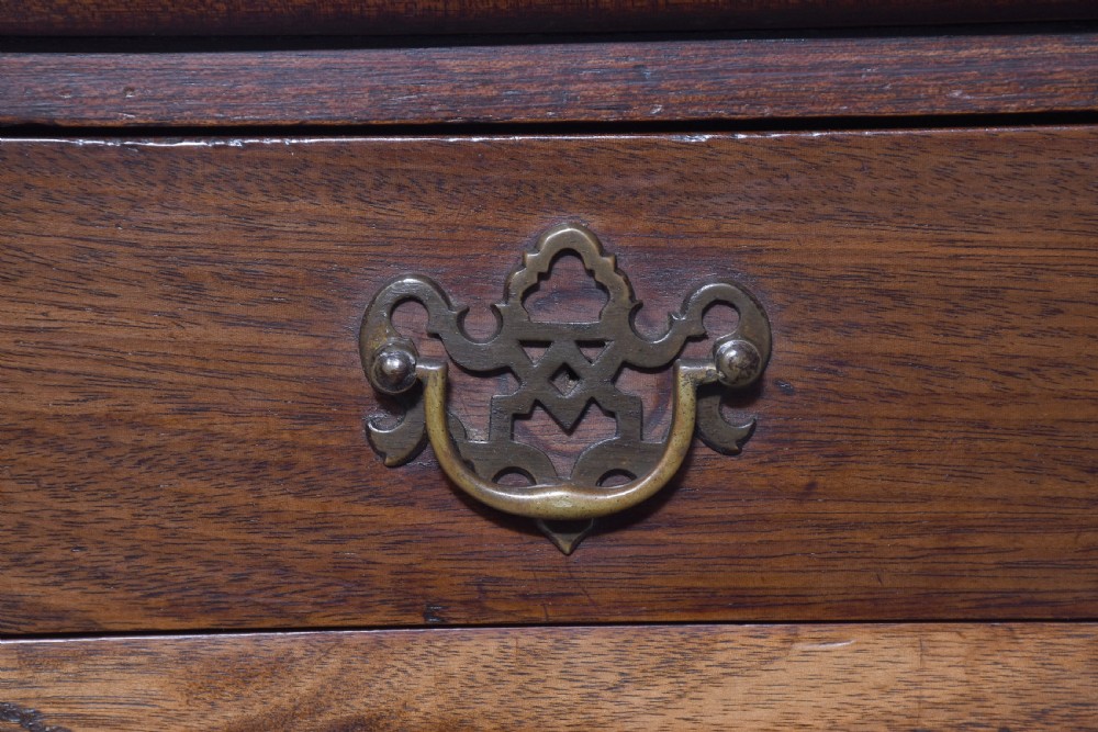 A George III mahogany triple top games table featuring cabriole legs ending in pad feet and a single frieze drawer with a brass handle. View III