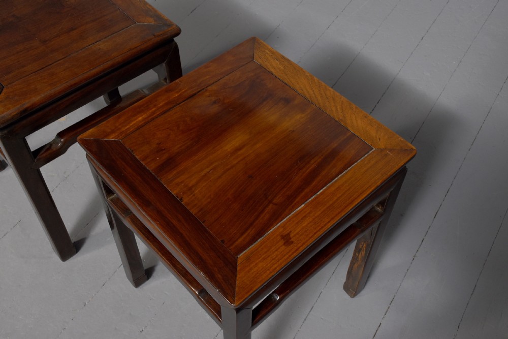 A pair of dark reddish-brown Chinese hongmu hardwood stands featuring square tops, straight legs, and humpback stretchers. View III
