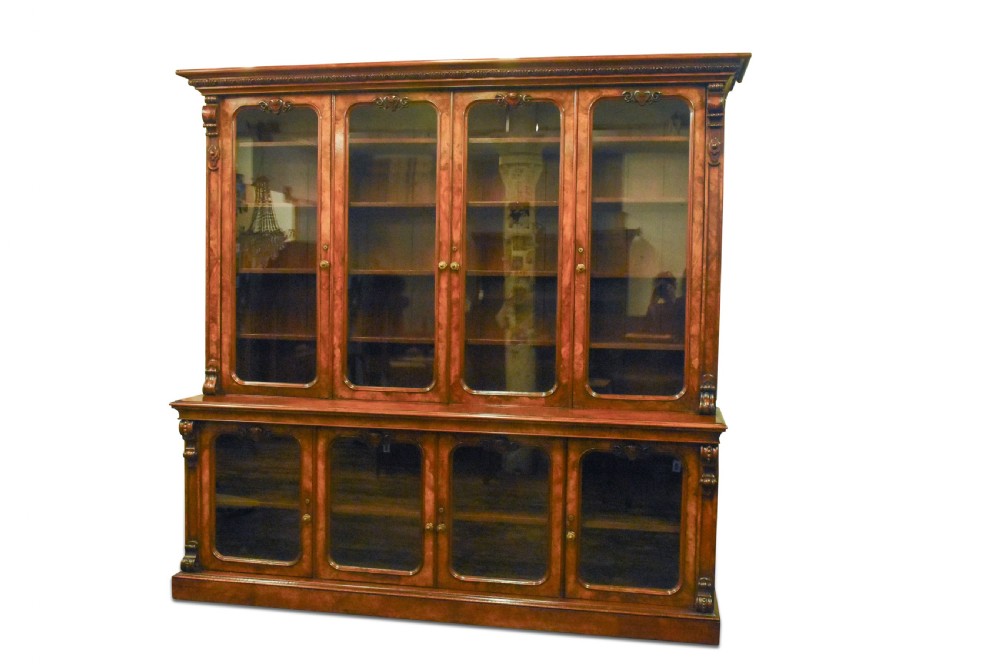 Exhibition quality four door Victorian carved, burr walnut cabinet bookcase View V