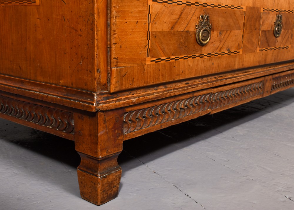 An 18th-century walnut bureau bookcase featuring geometric marquetry, a slant-front writing surface, multiple drawers, and an architectural top pediment. View XIV