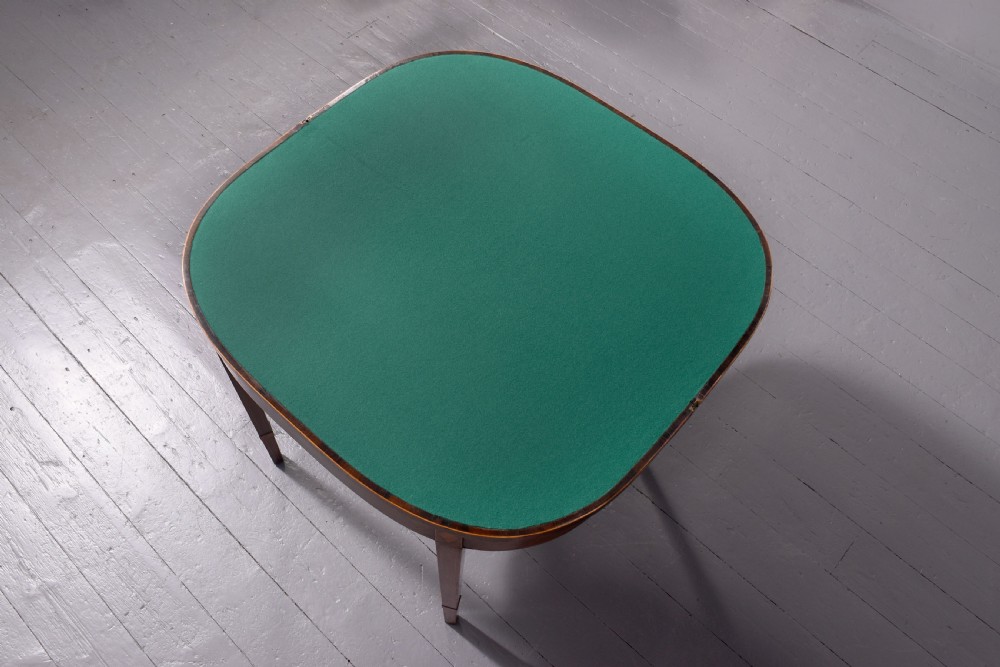 A George III rosewood fold-over card table displaying a green baize interior, satinwood stringing, and square tapered legs. View II