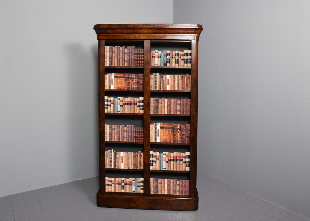 Mid-Victorian figured walnut, two-section, tall open bookcase