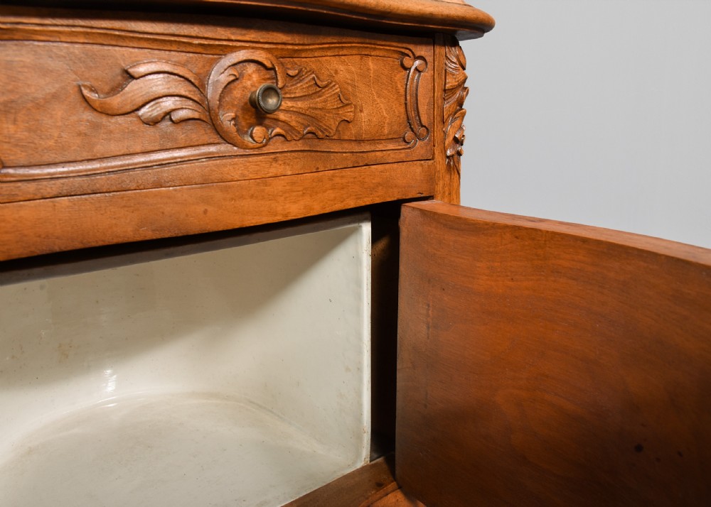 A pair of carved walnut French Louis XIV style bedside cabinets featuring marble tops and slender cabriole legs. View IV