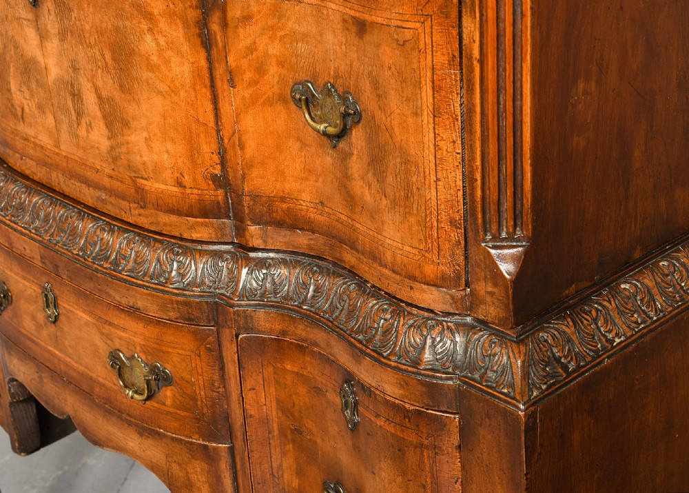 George I style crossbanded, figured walnut chest on stand. View IV