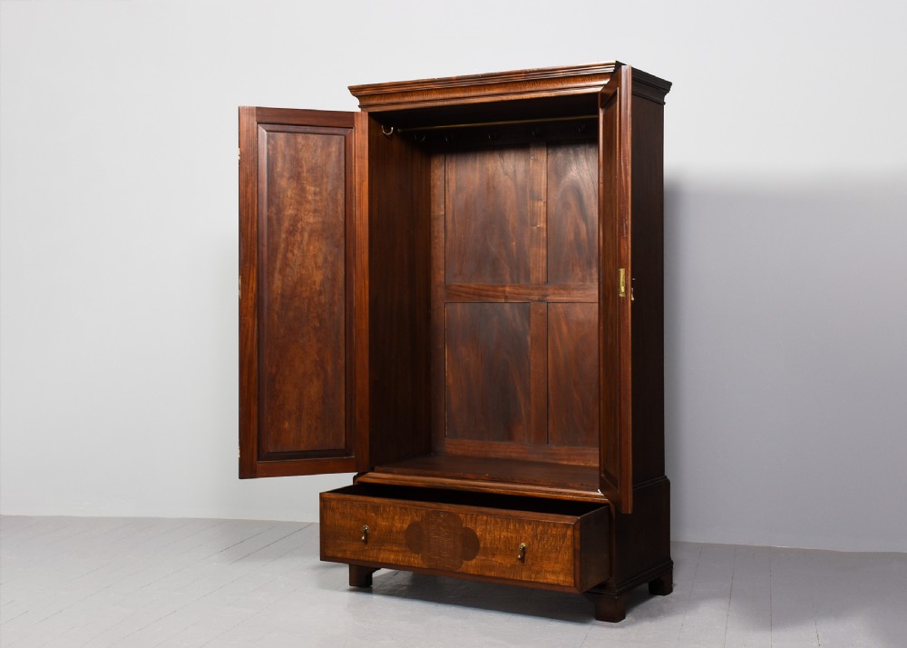 Quality Whytock and Reid neat-sized, two-door mahogany wardrobe with sycamore and figured walnut panelled doors View III