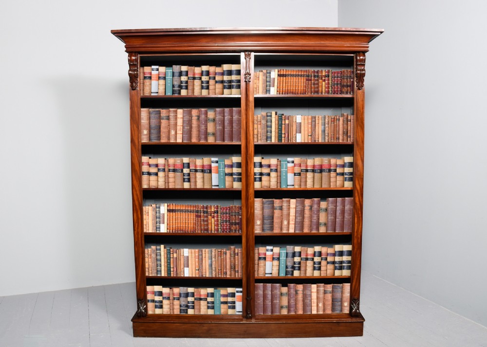 Tall Victorian two-section mahogany open bookcase with 5 shelves.