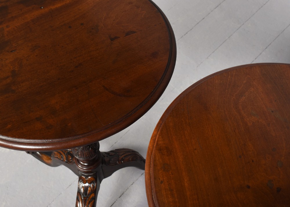 A pair of 19th-century mahogany tripod occasional tables featuring circular tops, carved turned central shafts, and three cabriole legs with scroll feet. View III