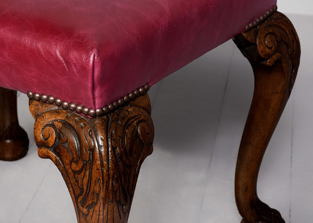 George III style rectangular stool upholstered in a quality burgundy hide with brass studding View III