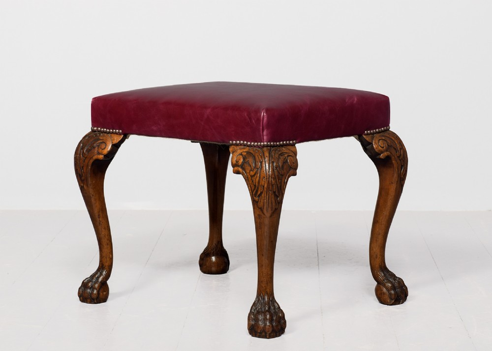 George III style rectangular stool upholstered in a quality burgundy hide with brass studding View V