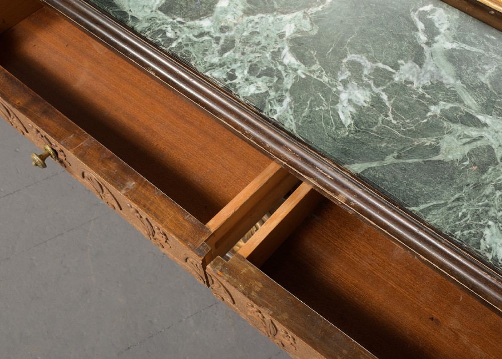 An Italian carved giltwood console table featuring a green marble top and an integrated tall rectangular mirror frame. View IX