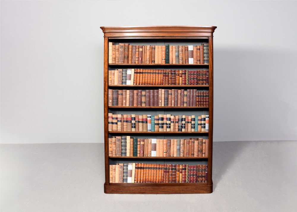 A tall Victorian mahogany open bookcase featuring a moulded cornice, six open shelves, and a grey painted back panel. View II