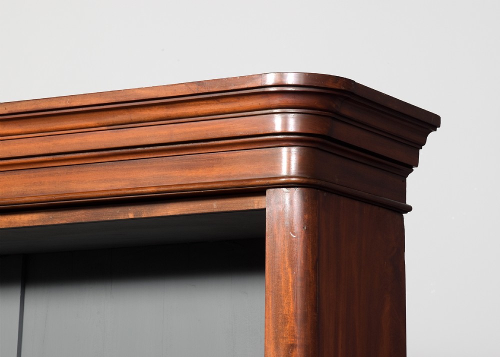 A tall Victorian mahogany open bookcase featuring a moulded cornice, six open shelves, and a grey painted back panel. View III