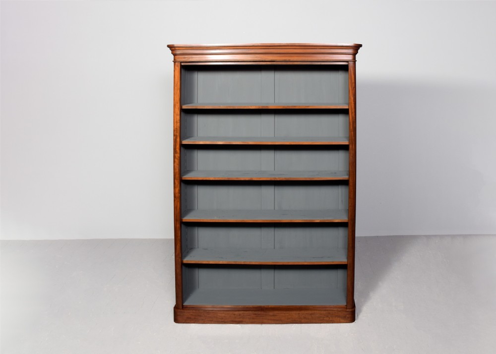 A tall Victorian mahogany open bookcase featuring a moulded cornice, six open shelves, and a grey painted back panel. View VI