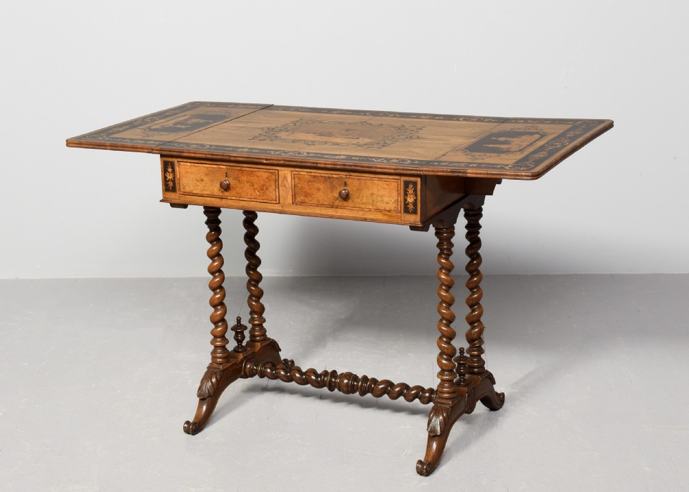 An Italian Sorrento olivewood sofa table featuring intricate marquetry figure inlays, drop-leaf side flaps, two drawers, and barley twist legs connected by a turned stretcher. View II