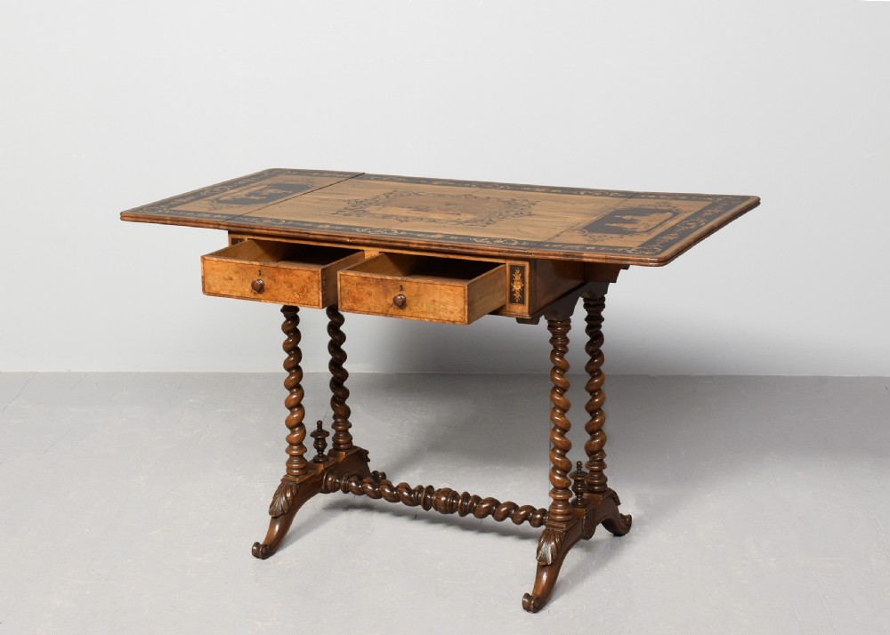 An Italian Sorrento olivewood sofa table featuring intricate marquetry figure inlays, drop-leaf side flaps, two drawers, and barley twist legs connected by a turned stretcher. View III
