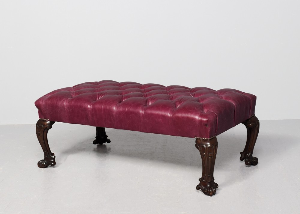 Large, Georgian-style mahogany-framed, buttoned red hide upholstered Georgian-style footstool