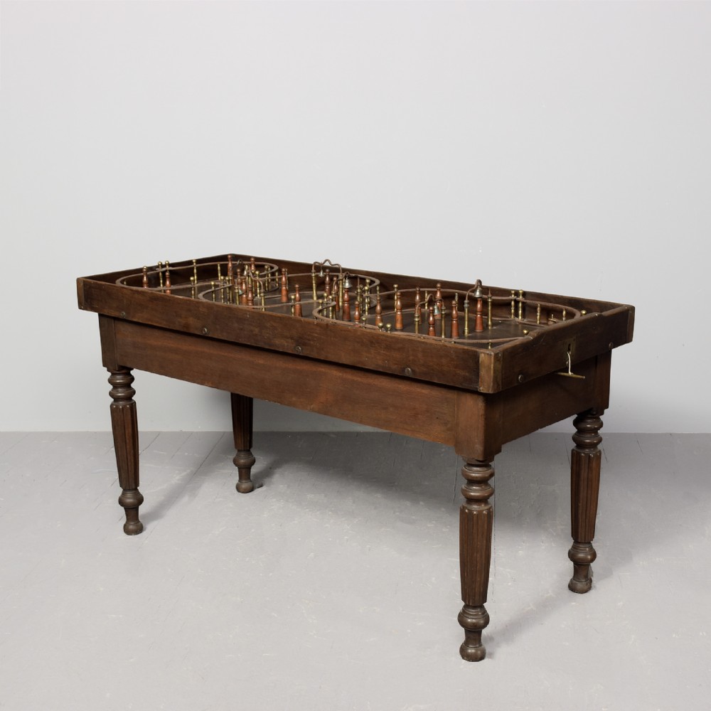 A George IV Free Standing Oak Skittles Game 