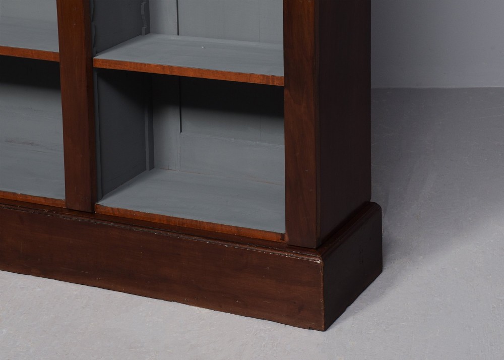 A large three-section mahogany open bookcase featuring adjustable shelves and fine inlay detailing along the top cornice. View V