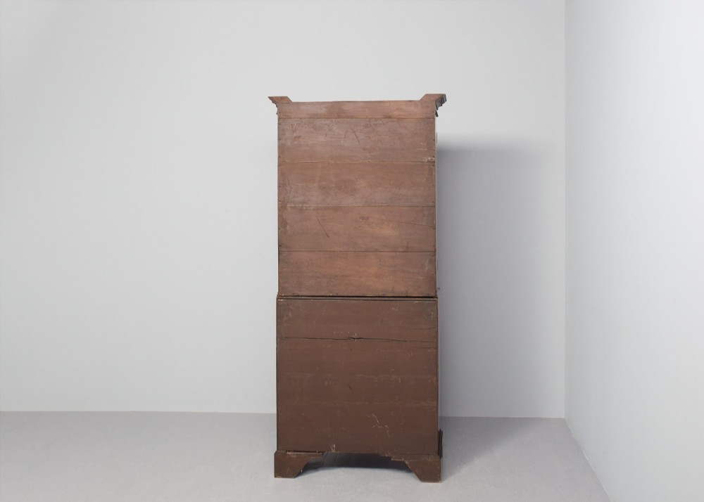 A late eighteenth-century George III mahogany secretaire bookcase featuring an upper glazed cabinet and a lower chest of drawers on bracket feet. View XIII