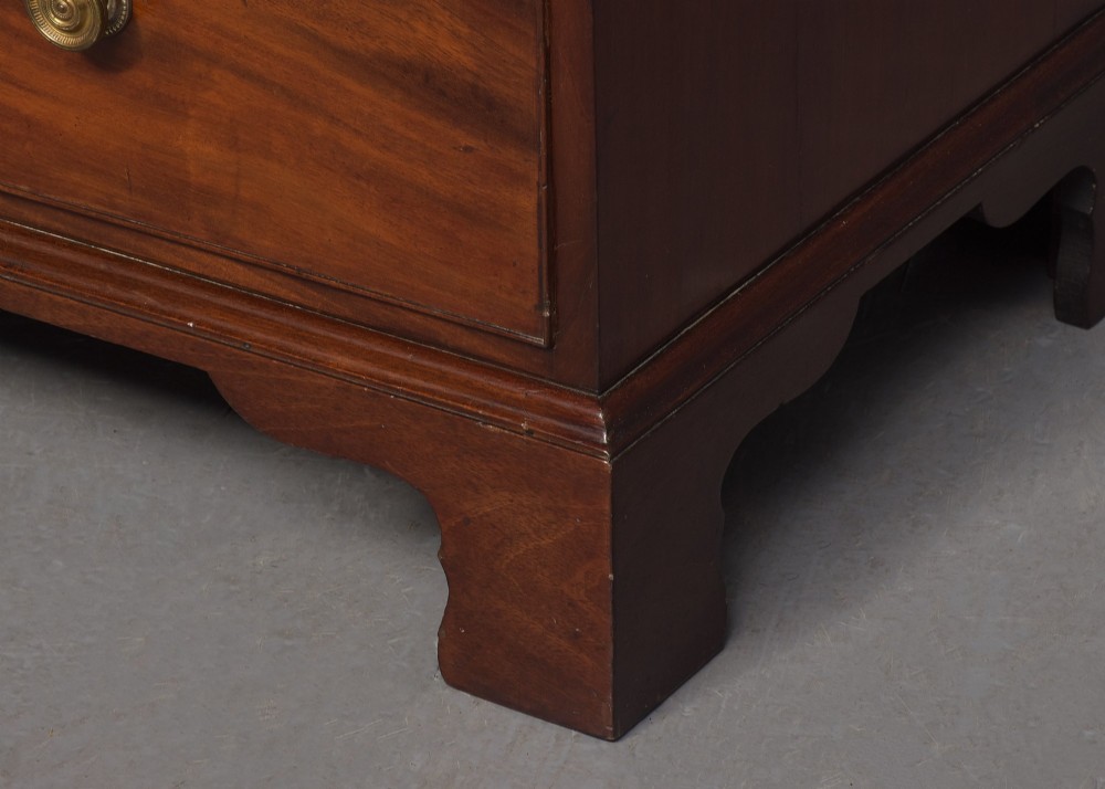 A late eighteenth-century George III mahogany secretaire bookcase featuring an upper glazed cabinet and a lower chest of drawers on bracket feet. View XIV