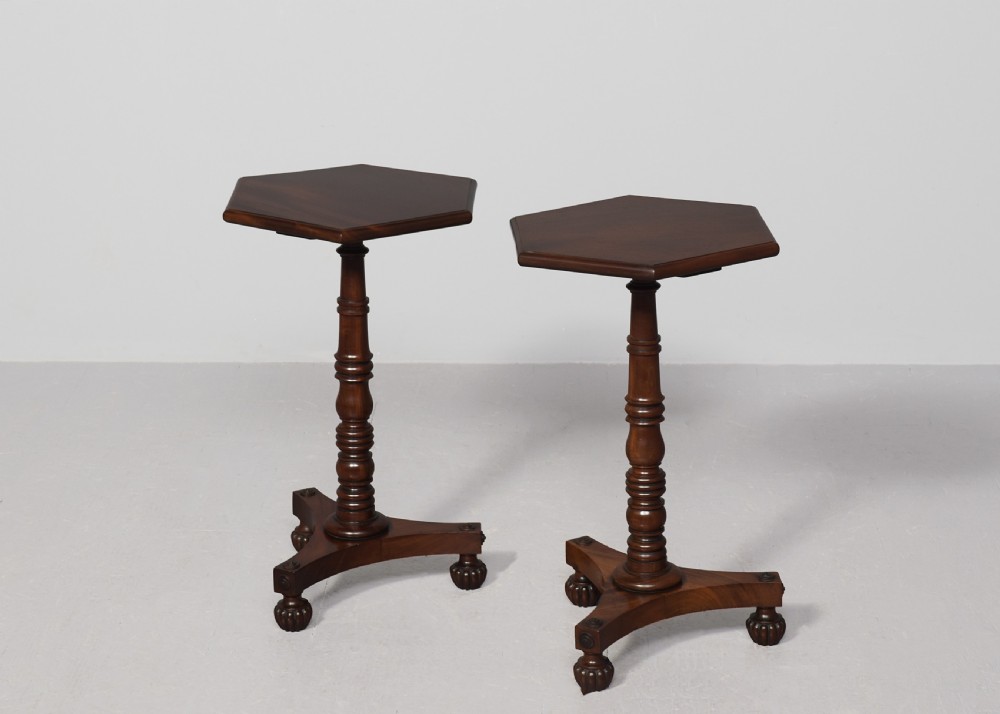 A pair of dark mahogany William IV wine tables featuring hexagonal tops, turned column pedestals, and triform bases. View II