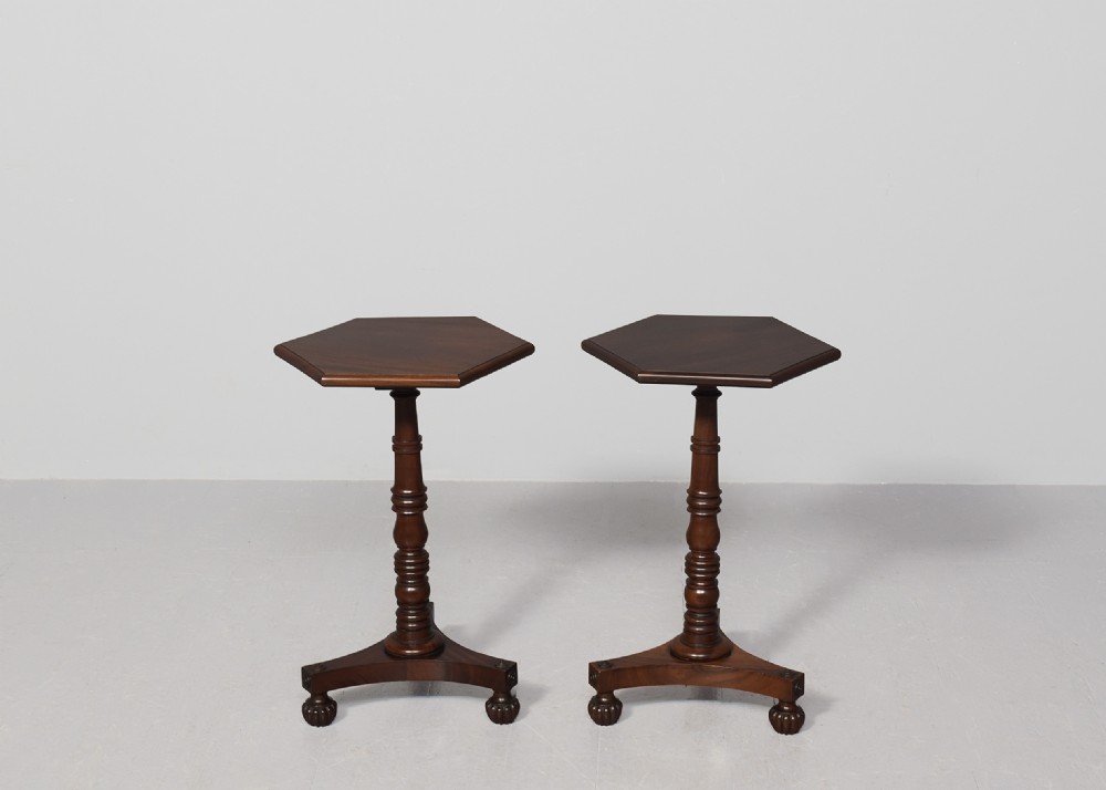 A pair of dark mahogany William IV wine tables featuring hexagonal tops, turned column pedestals, and triform bases. View V