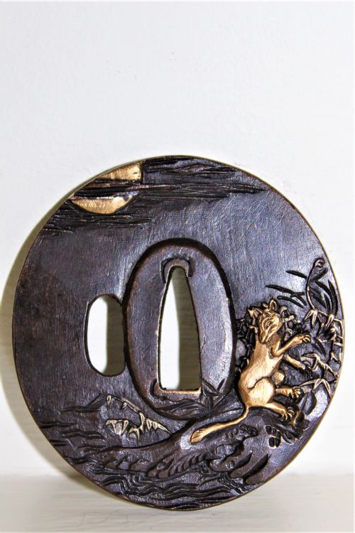 A Fine Quality Japanese Bronze Tsuba Overlaid with Gold and Silver Circa 1880
