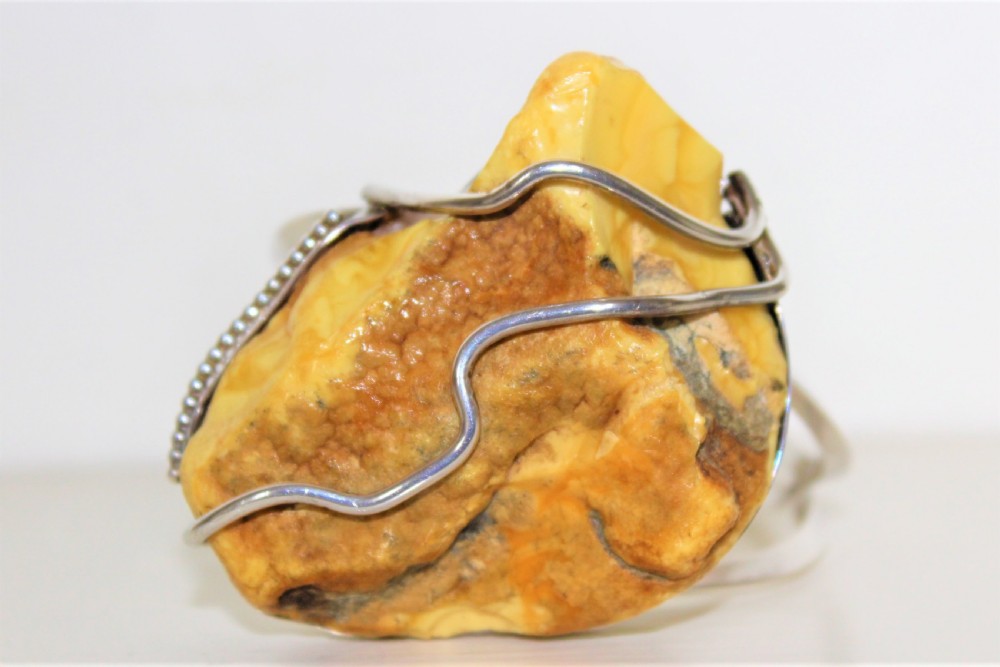 An impressive Silver Mounted Raw Amber Bracelet View IX