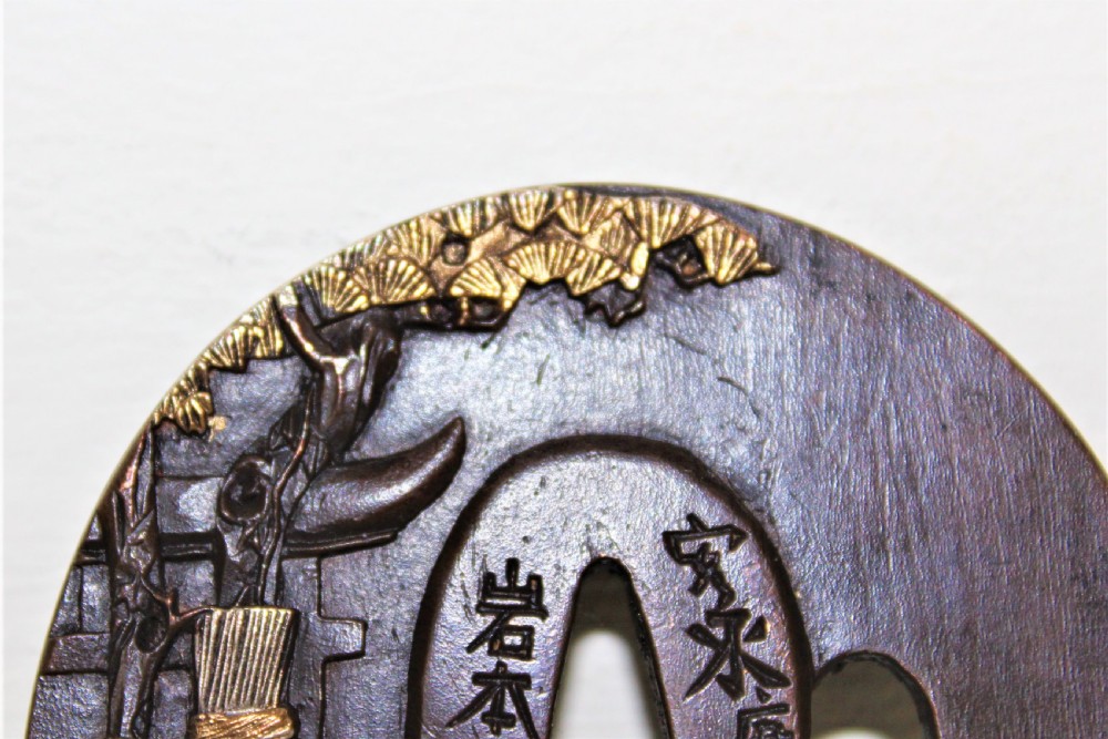 A fine quality Japanese bronze Tsuba overlaid with gold and silver Circa 1880 View VI