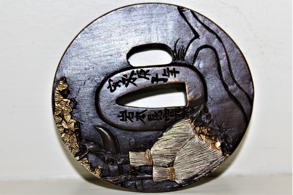 A fine quality Japanese bronze Tsuba overlaid with gold and silver Circa 1880 View VII
