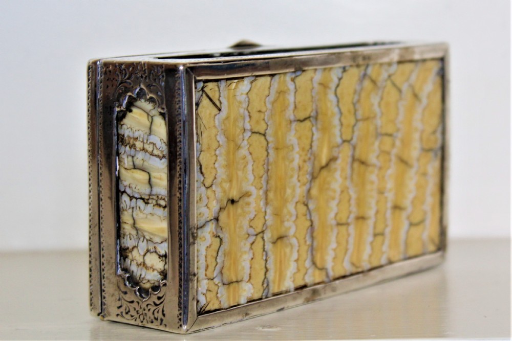Rare table snuff box of large proportions made of slabs of mammoth tooth and finely hand chased silver unmarked  View II