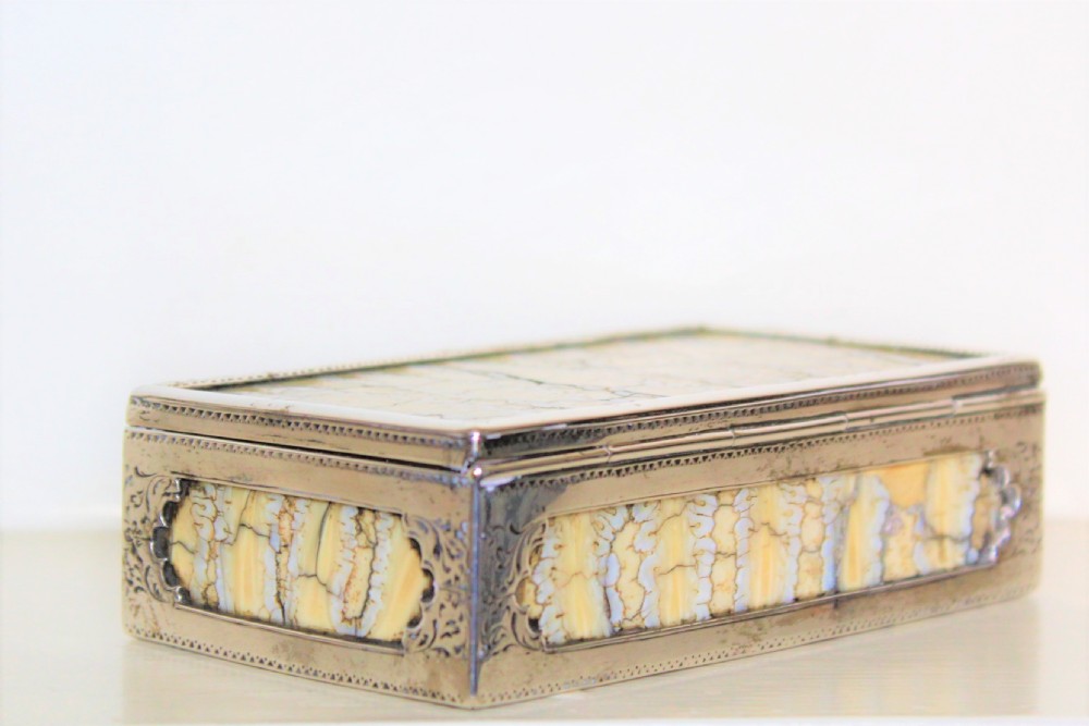 Rare table snuff box of large proportions made of slabs of mammoth tooth and finely hand chased silver unmarked  View III
