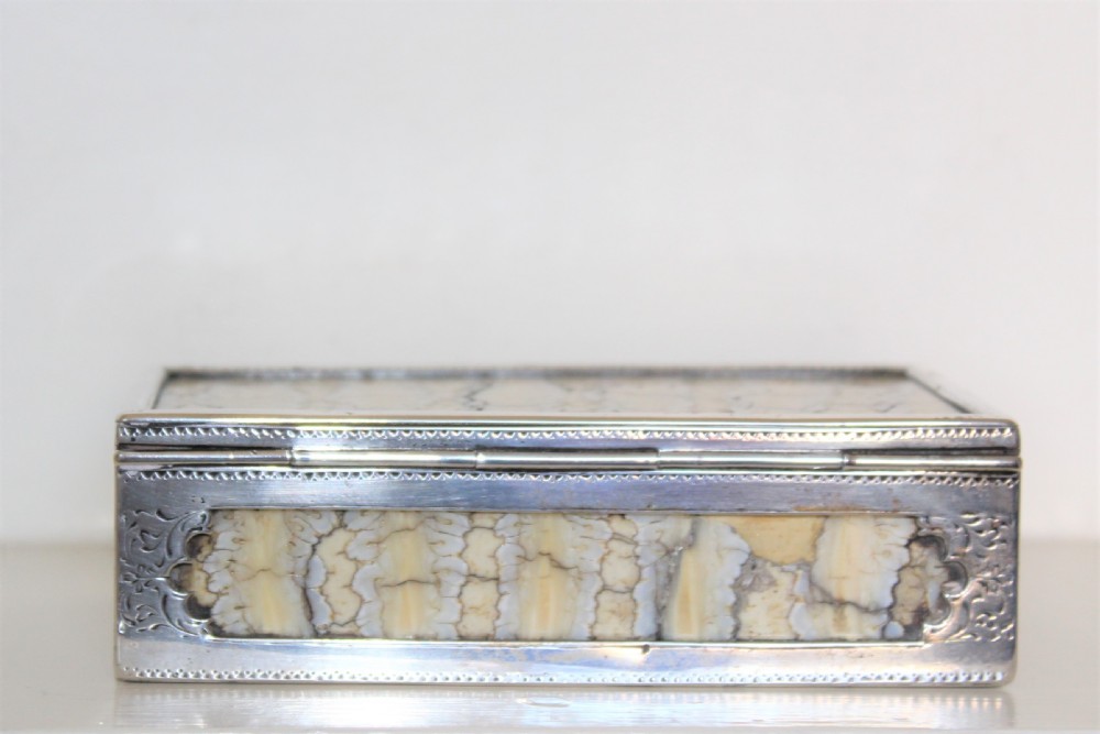 Rare table snuff box of large proportions made of slabs of mammoth tooth and finely hand chased silver unmarked  View VII