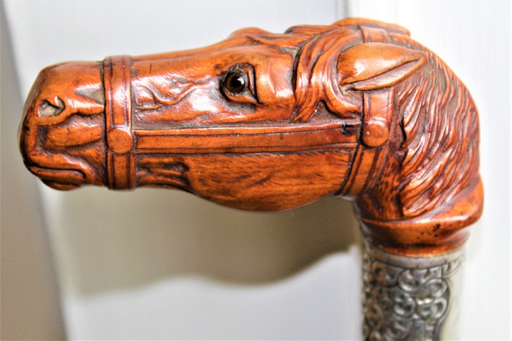 A very finely carved and detailed wood horses head walking stick English Circa 1880