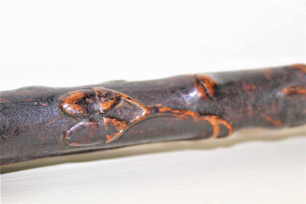 A charmingly carved 18th century wood folk art walking stick with a wonderful deep patina  View III