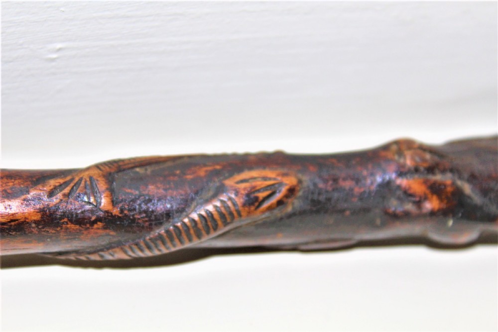 A charmingly carved 18th century wood folk art walking stick with a wonderful deep patina  View VII