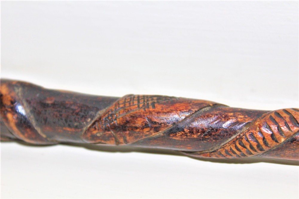 A charmingly carved 18th century wood folk art walking stick with a wonderful deep patina  View IX