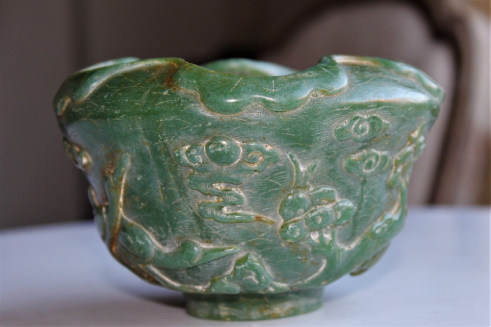 A very attractive Chinese green jade bowl with decoration of cherry blossom and birds  View VI