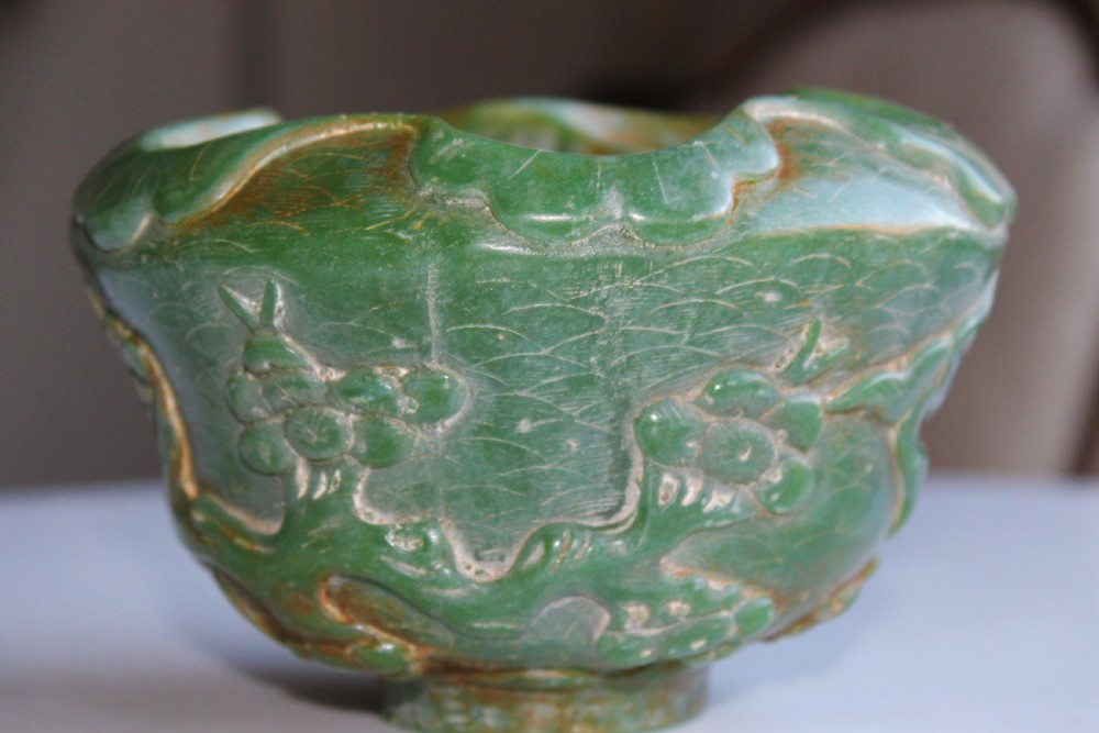 A very attractive Chinese green jade bowl with decoration of cherry blossom and birds  View IV