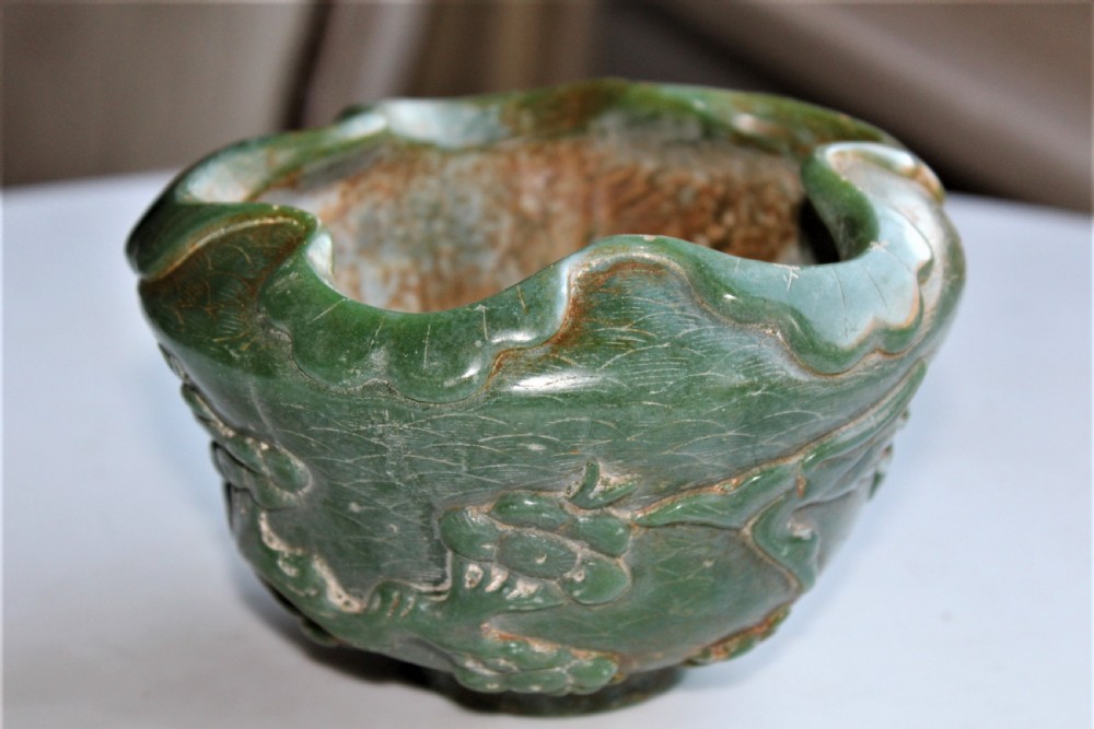 A very attractive Chinese green jade bowl with decoration of cherry blossom and birds  View VII