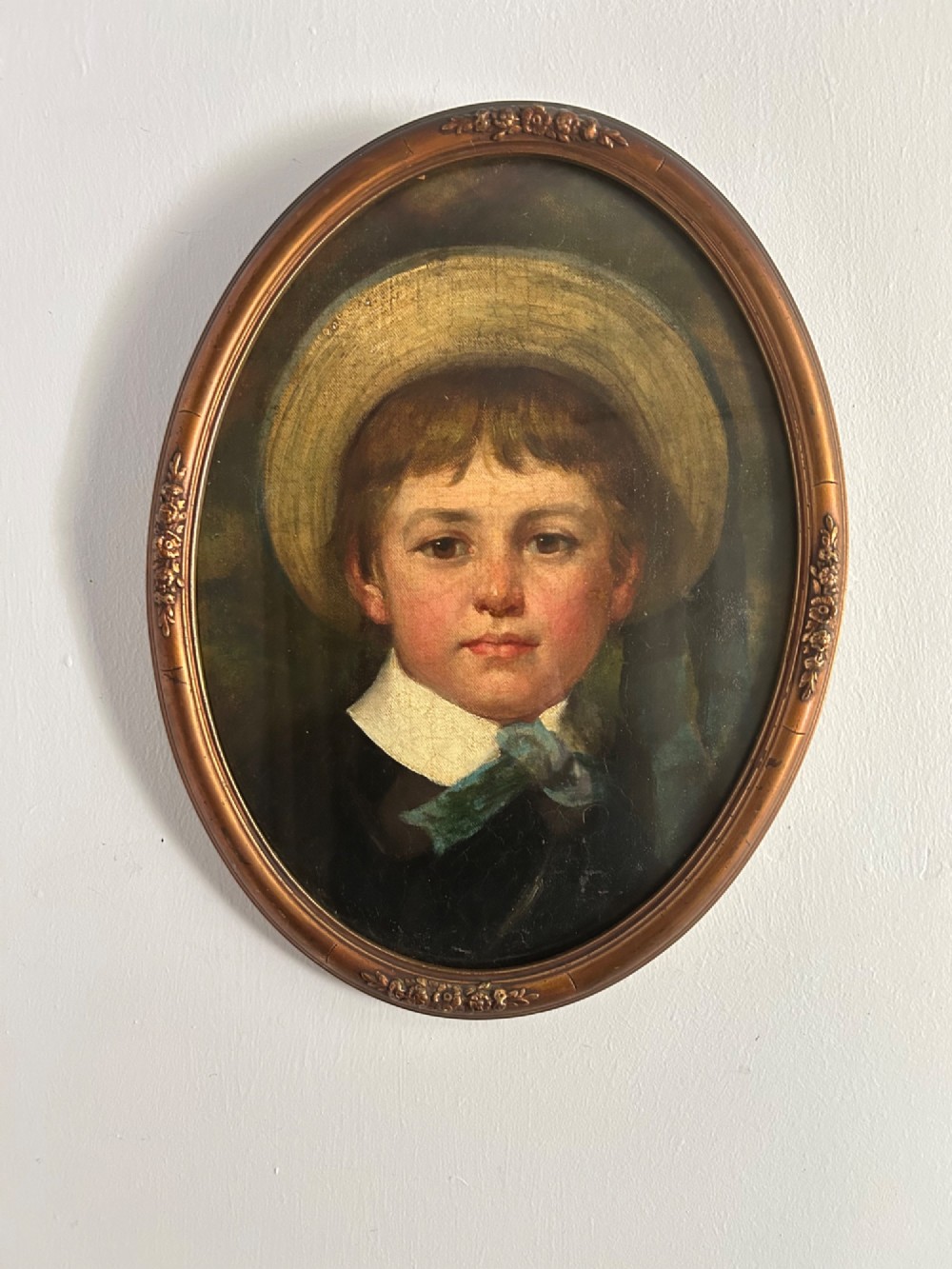 A delightful Victorian oil painting of a young boy wearing a straw boater View II