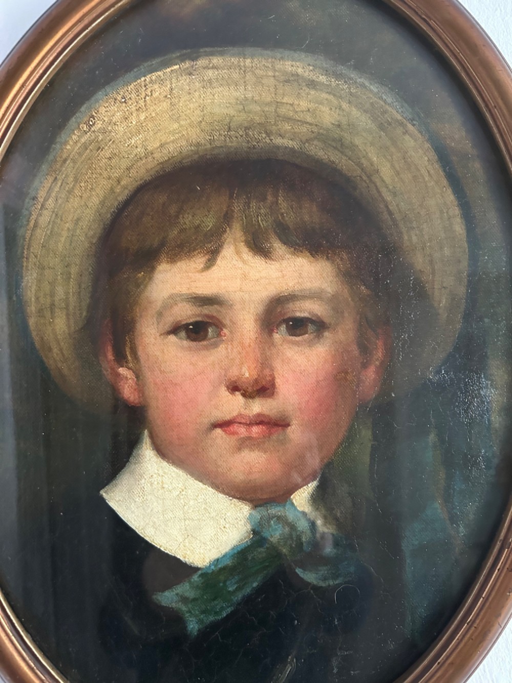 A delightful Victorian oil painting of a young boy wearing a straw boater View III