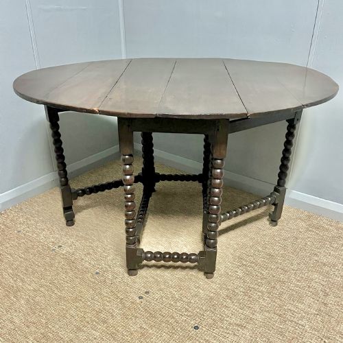 17th century Oak gateleg table with bobbin legs and drawer