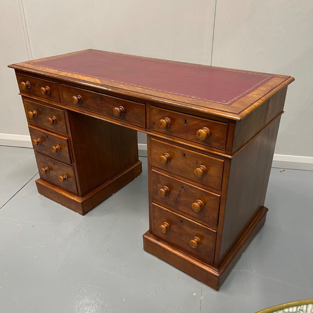 Victorian kneehole pedestal desk with leather top View IV