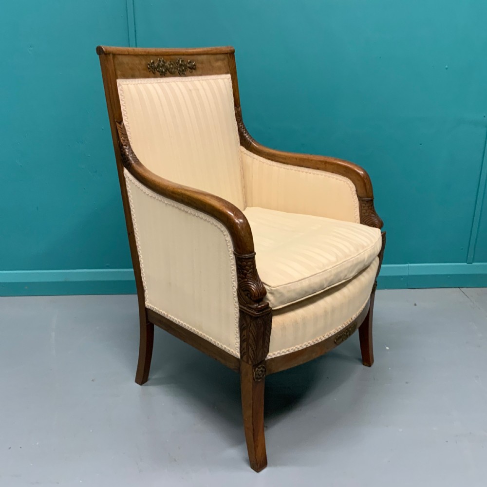 French Empire style armchair with brass mounts