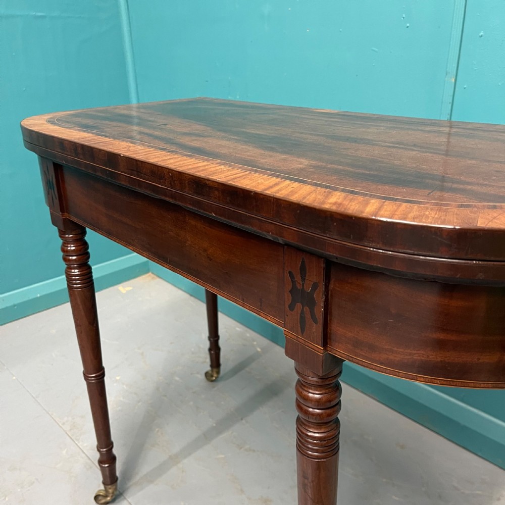 Regency cross banded games table on castors View III