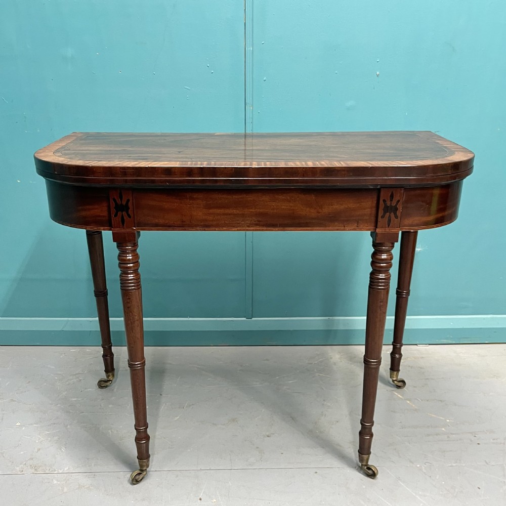 Regency cross banded games table on castors View VII