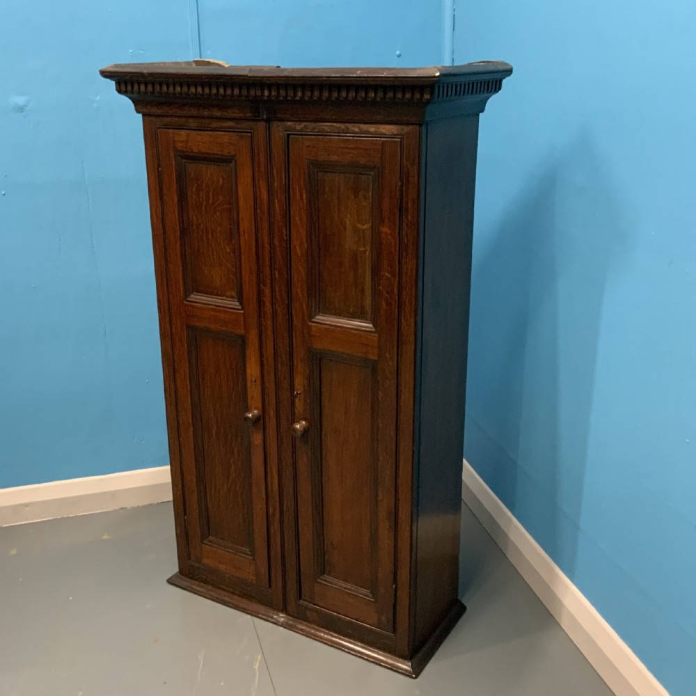 Georgian oak panelled hanging cupboard  View II