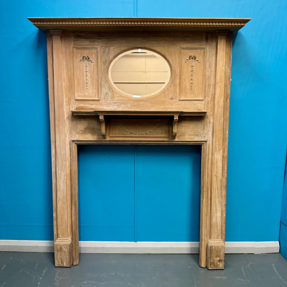 Art Nouveau fire surround with bevelled mirror