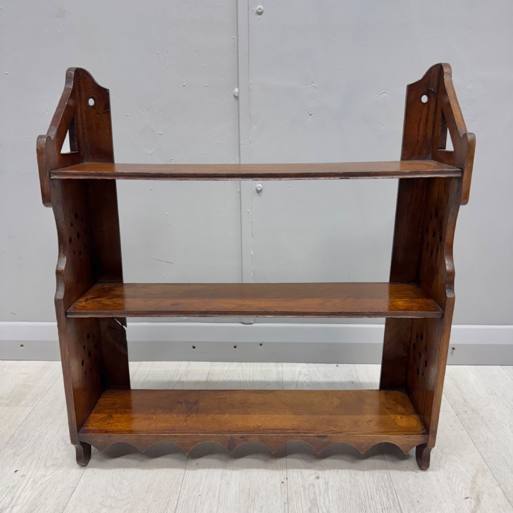 Arts and Crafts oak hanging shelves